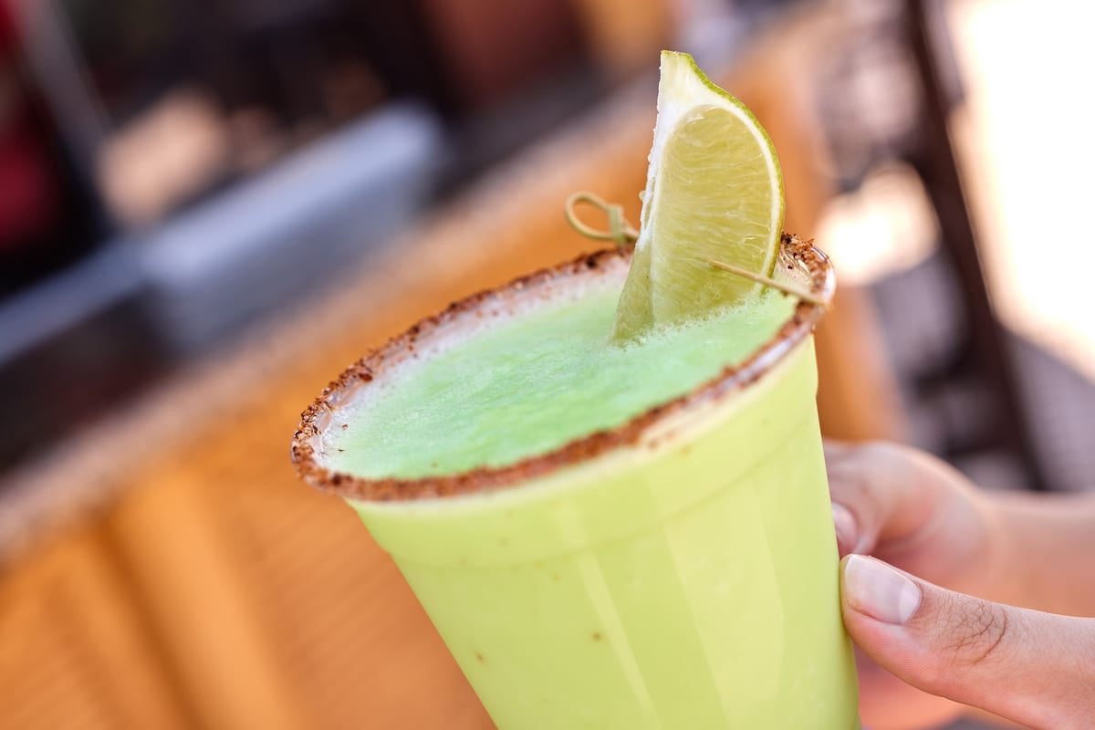 A frozen margarita topped with lime Dole Whip at Disney's Polynesian Village Resort