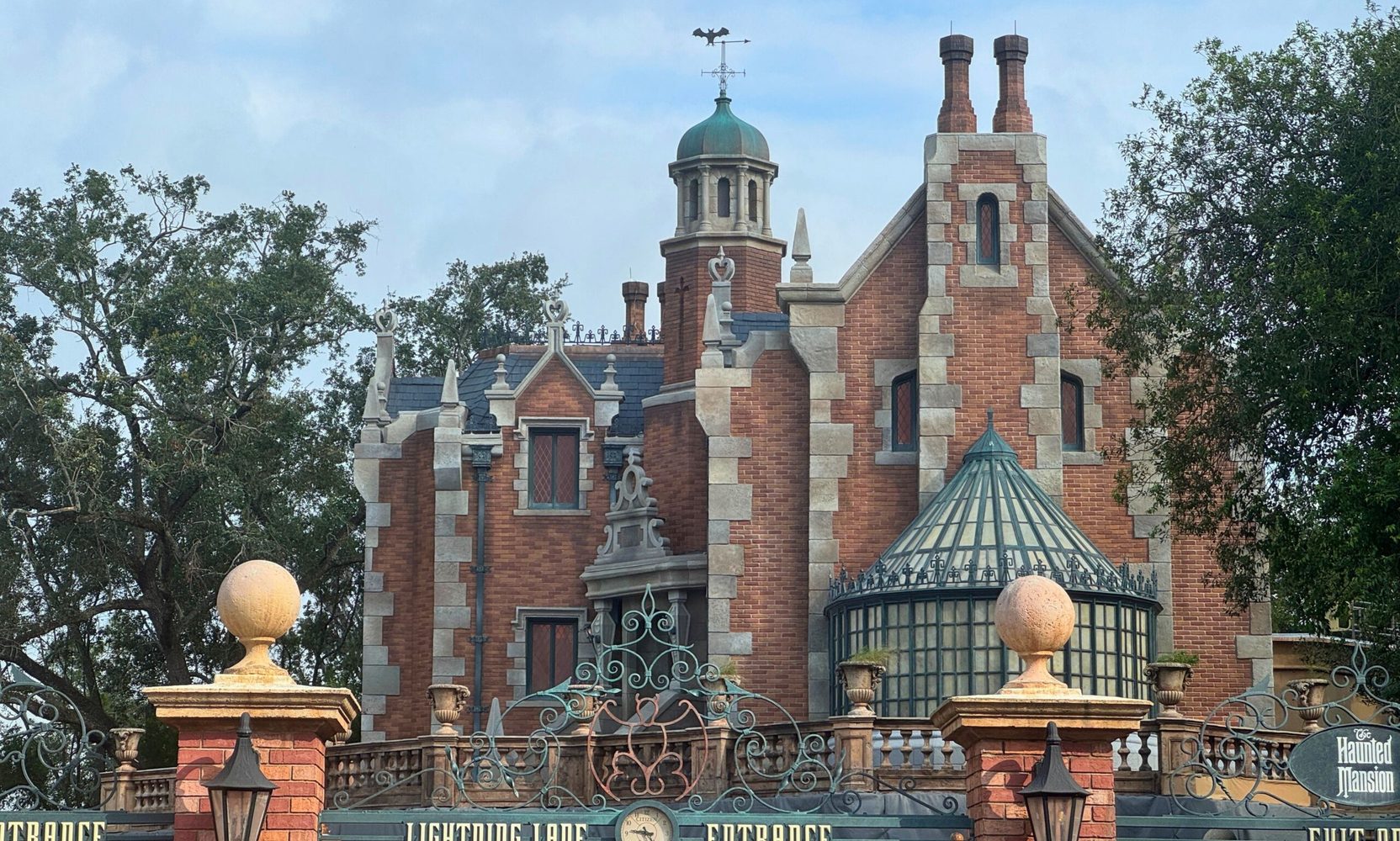 The Haunted Mansion Came Out From Behind the Scaffolding With a New Roof, Ashy Chimneys and Shrubs Still to Be Replanted