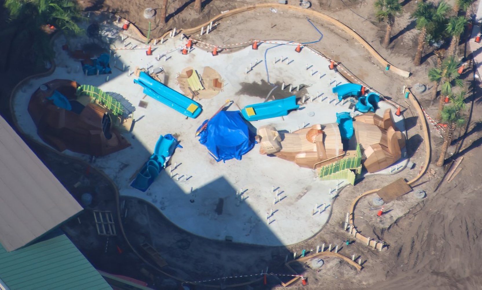 A Giant Wood-Look Otter Is Now Lying Across the Splash Pad at Disney's Lakeshore Lodge, and the Lazy River Loop Is Visible From the Air