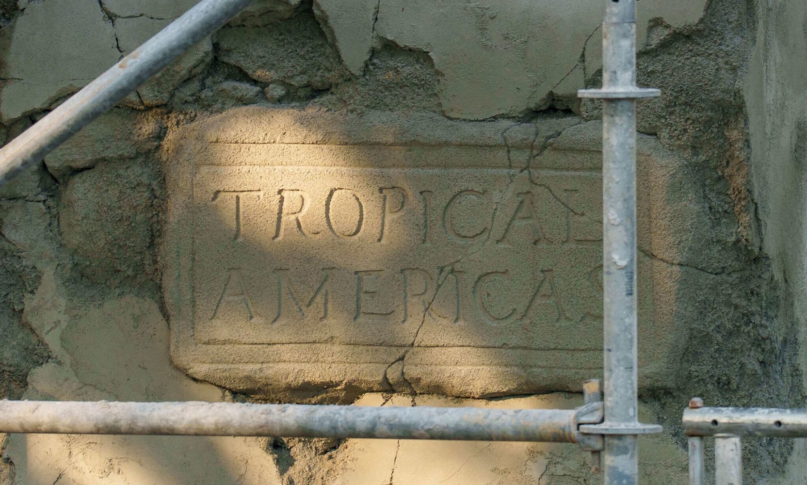A Cracked Stone Tablet Reading Tropical Americas Is Now Carved Into a Column at Animal Kingdom, and Not at the Main Entrance
