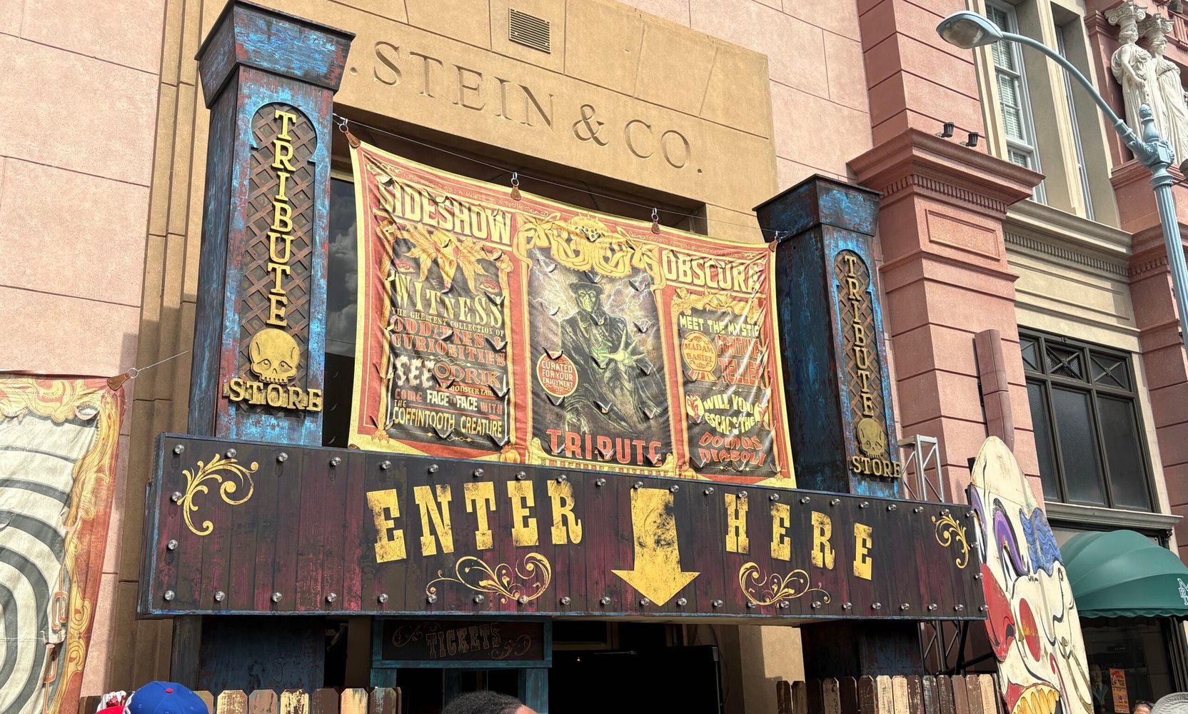 Universal's Sideshow Obscura Tribute Store Has a Skull Card Nodding to Poseidon's Fury, and a Banner Picturing a Tavern It Tore Down in 2008