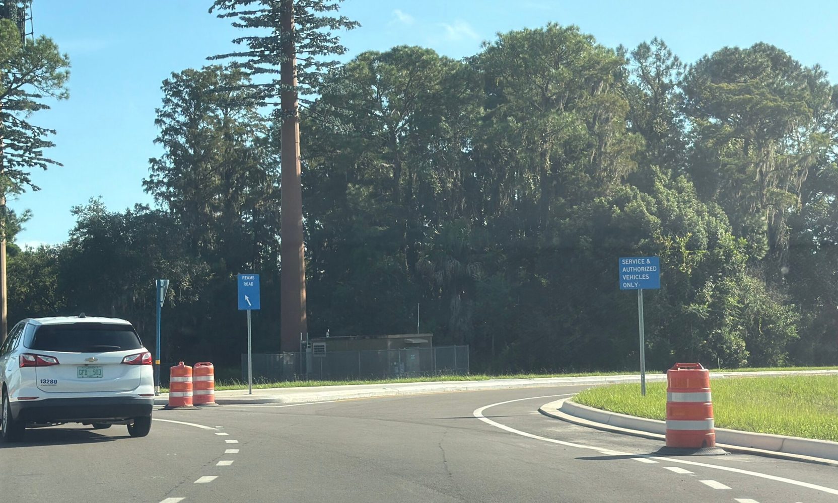 Disney's New Grand Floridian Entrance Sends Arriving Guests Down a Road Signed Service & Authorized Vehicles Only