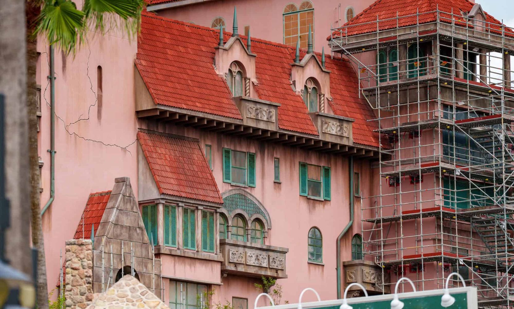 More of Tower of Terror's Repainted Facade Is Uncovered, and the Cracks, Stains and Rust Are Still There, on Purpose