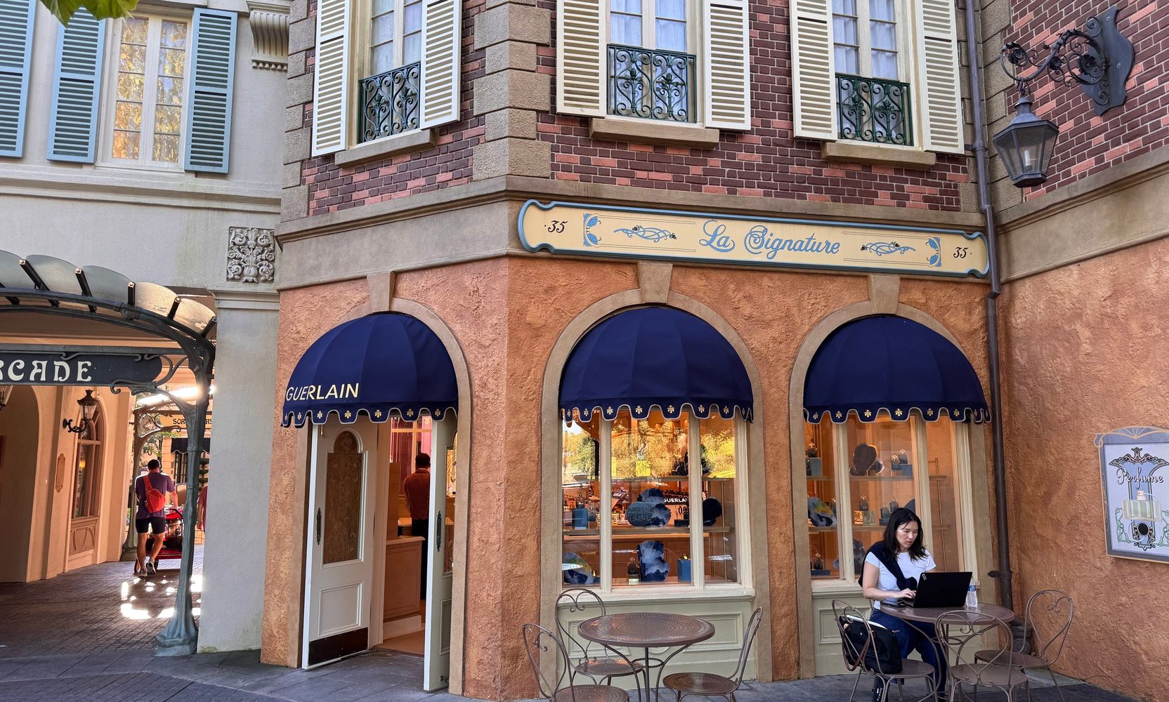 EPCOT's La Signature Reopens With Crystal Chandeliers and a Guerlain History Wall, but Its Engraving Machine Is Not Working Yet