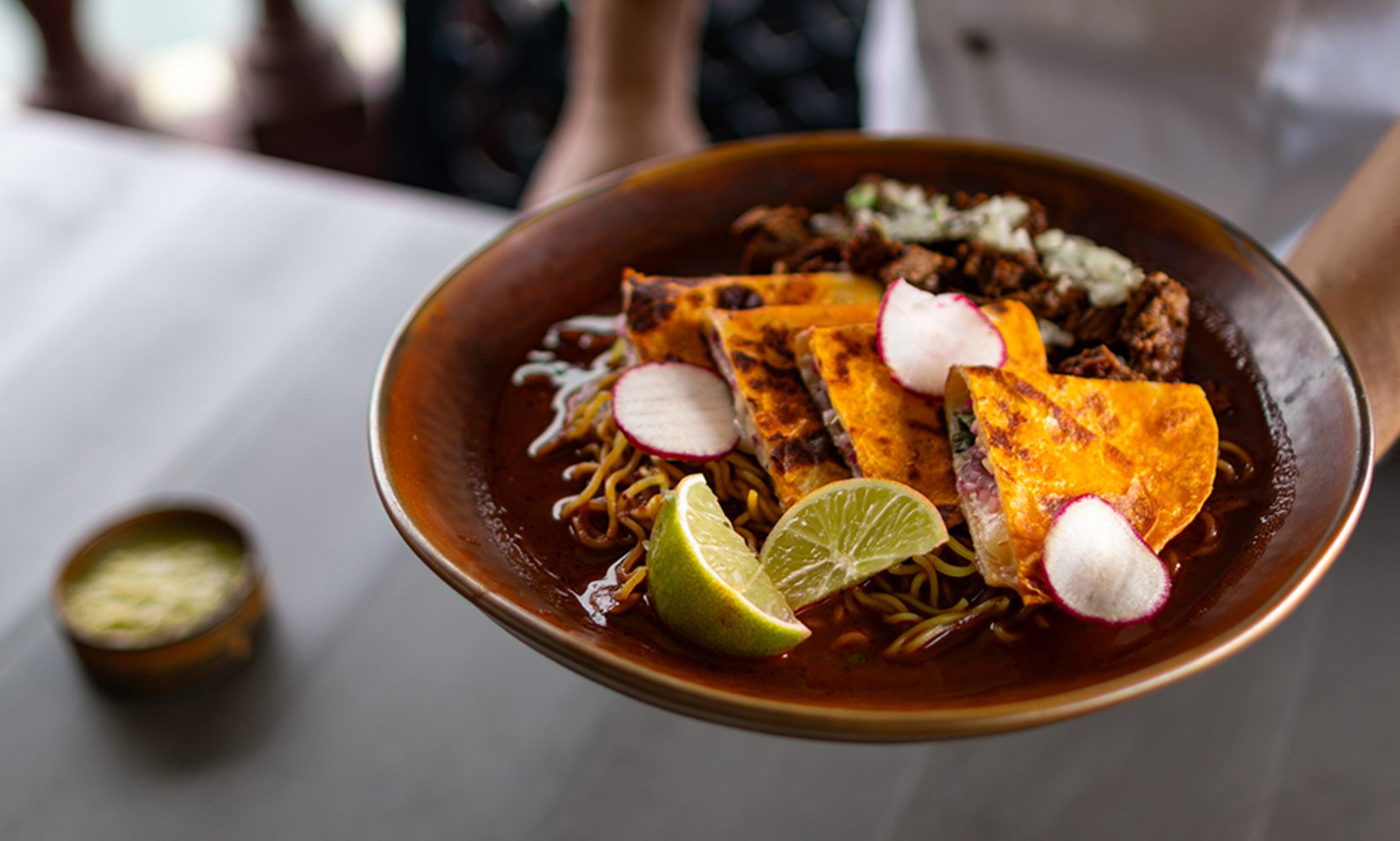 Universal's Hispanic Heritage Month Menu Puts Birria Ramen at Lombard's and Brings Back Voodoo's Margarita Doughnut