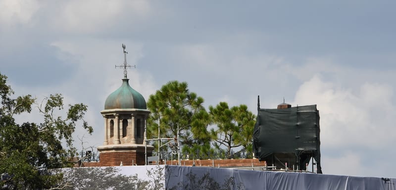 More Scrim Comes Off the Haunted Mansion and the Facade Underneath Has Changed: Green Cupola, Darker Brick, Lighter Stone