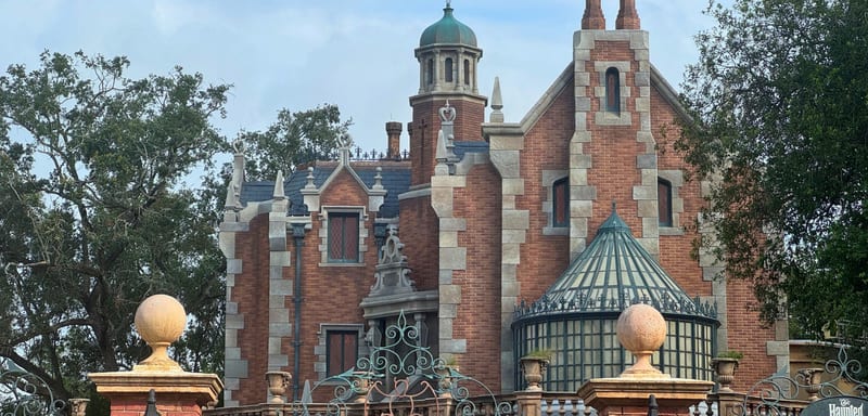 The Haunted Mansion Came Out From Behind the Scaffolding With a New Roof, Ashy Chimneys and Shrubs Still to Be Replanted