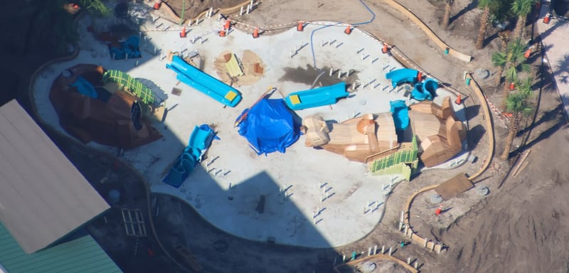 A Giant Wood-Look Otter Is Now Lying Across the Splash Pad at Disney's Lakeshore Lodge, and the Lazy River Loop Is Visible From the Air