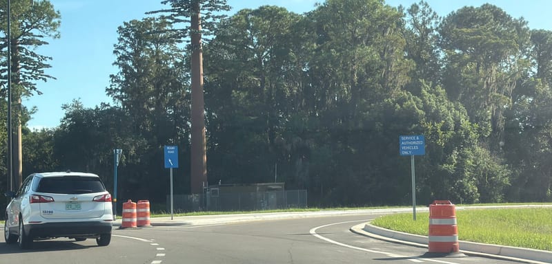 Disney's New Grand Floridian Entrance Sends Arriving Guests Down a Road Signed Service & Authorized Vehicles Only