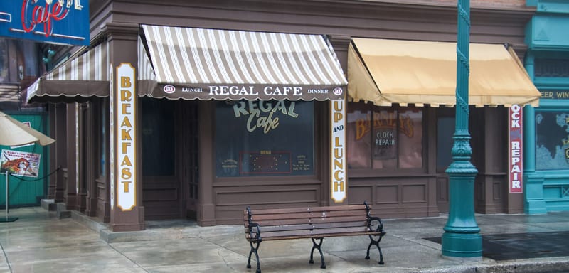 Finnegan's Construction Walls Start Coming Down at Universal Studios Florida, and the Regal Cafe Sign Is Back on Its Corner