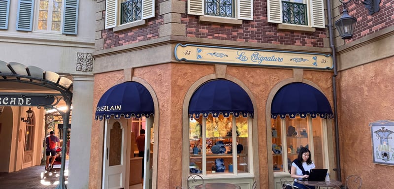 EPCOT's La Signature Reopens With Crystal Chandeliers and a Guerlain History Wall, but Its Engraving Machine Is Not Working Yet