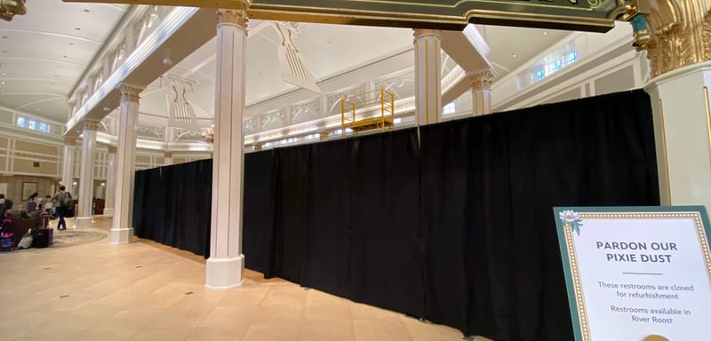 Port Orleans Riverside's Lobby Is Partly Behind Black Curtains, With Its Restrooms Closed and Mailbox Moved
