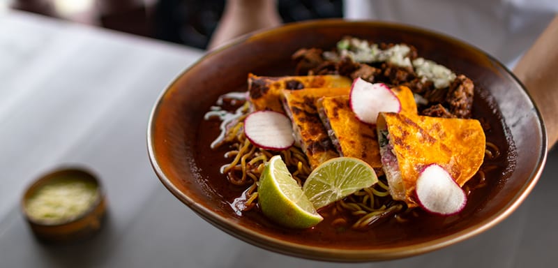 Universal's Hispanic Heritage Month Menu Puts Birria Ramen at Lombard's and Brings Back Voodoo's Margarita Doughnut