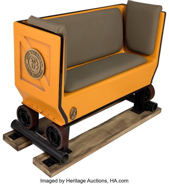 A Big Thunder Mountain Railroad mine-car section rebuilt as a bench, an auction lot