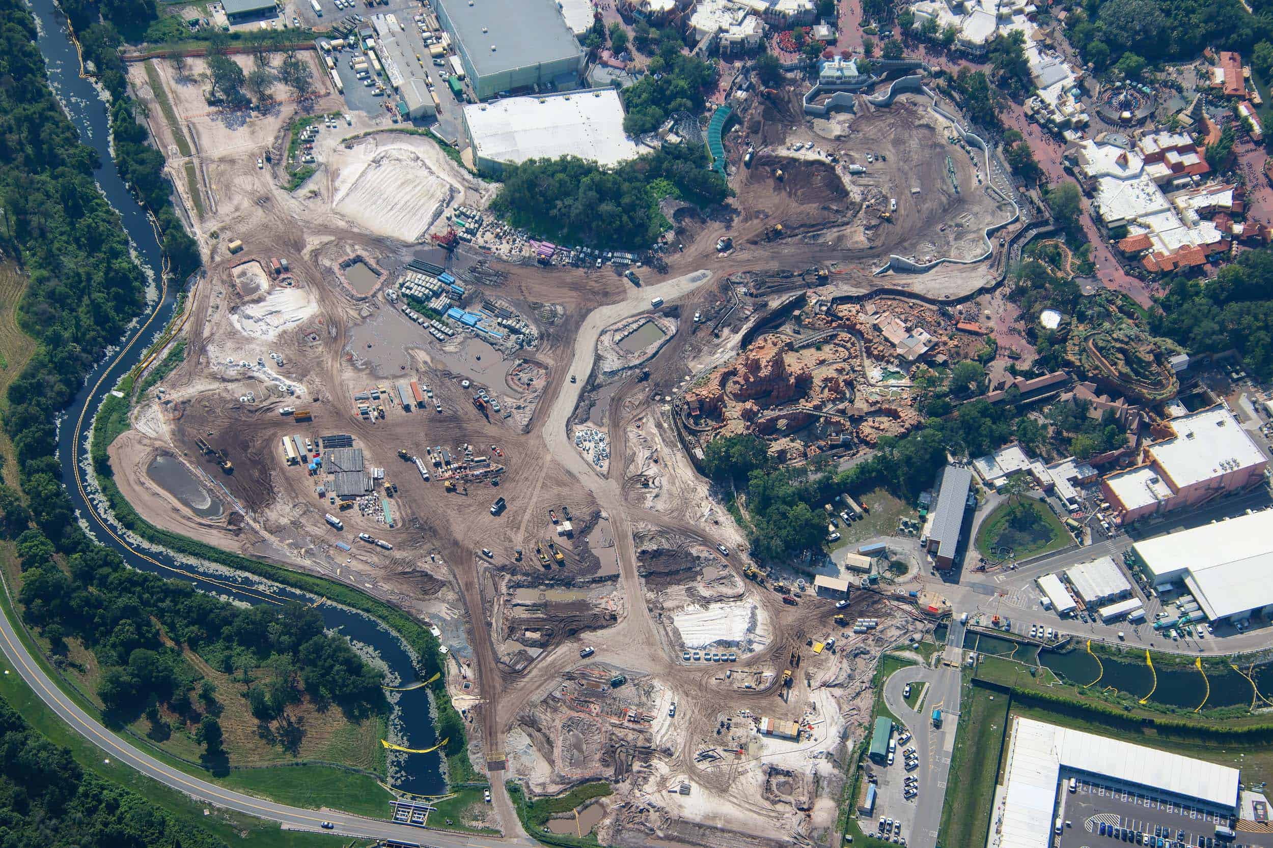 Aerial view of the cleared construction site for Piston Peak and Disney Villains Land at Magic Kingdom