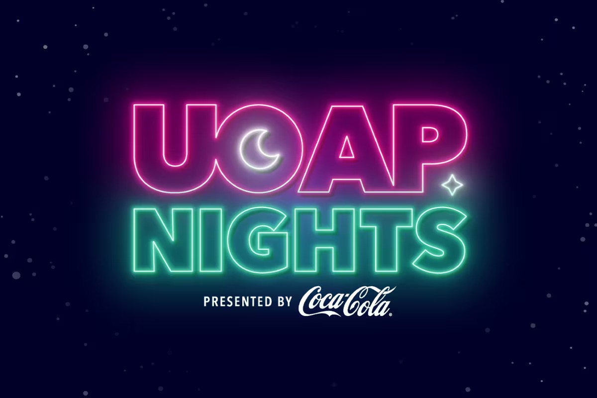 Neon-styled UOAP Nights logo in pink and green lettering with a crescent moon, on a dark starry background, above the words presented by Coca-Cola