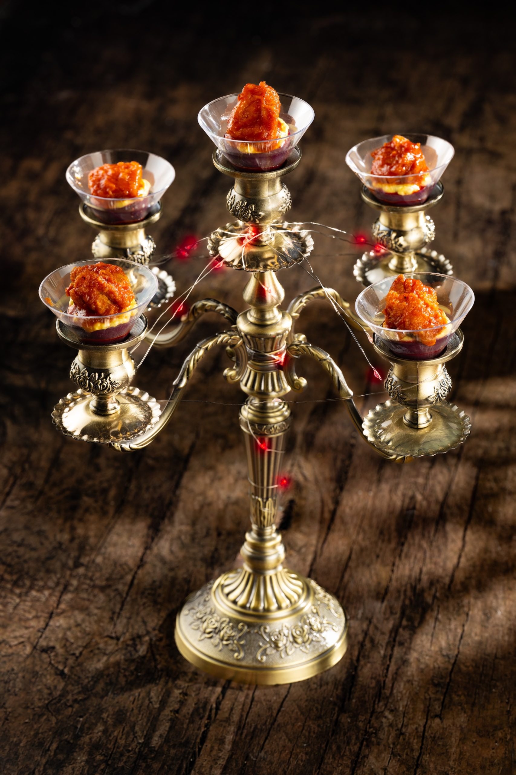 Candelabra Eggs at Jock Lindsey's Hangar Bar, deviled eggs topped with crispy fried chicken and sauce