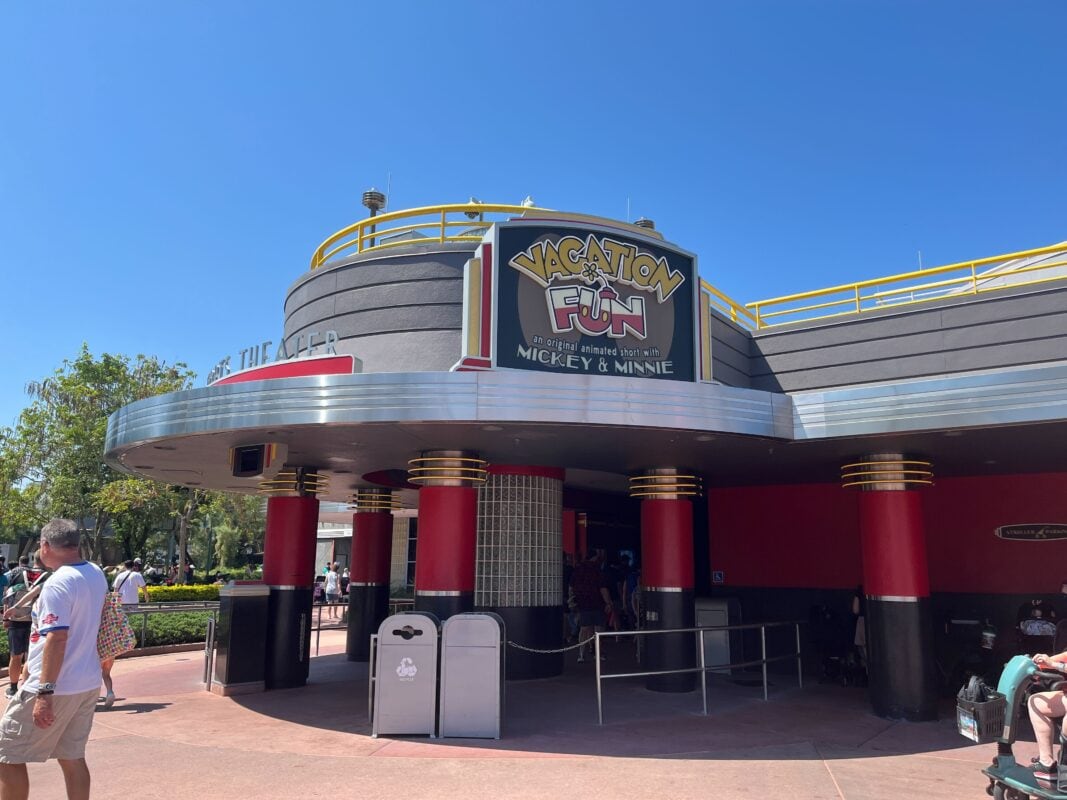 The exterior of Mickey Shorts Theater at Disney's Hollywood Studios, with a marquee reading Vacation Fun, an original animated short with Mickey and Minnie