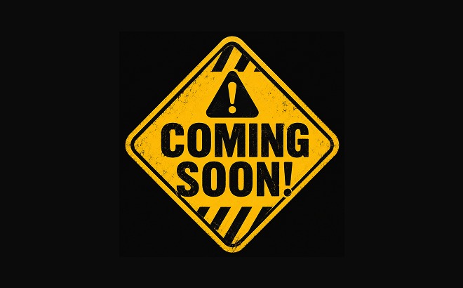 A yellow hazard diamond road sign with a black warning triangle inside it reading COMING SOON on a black background