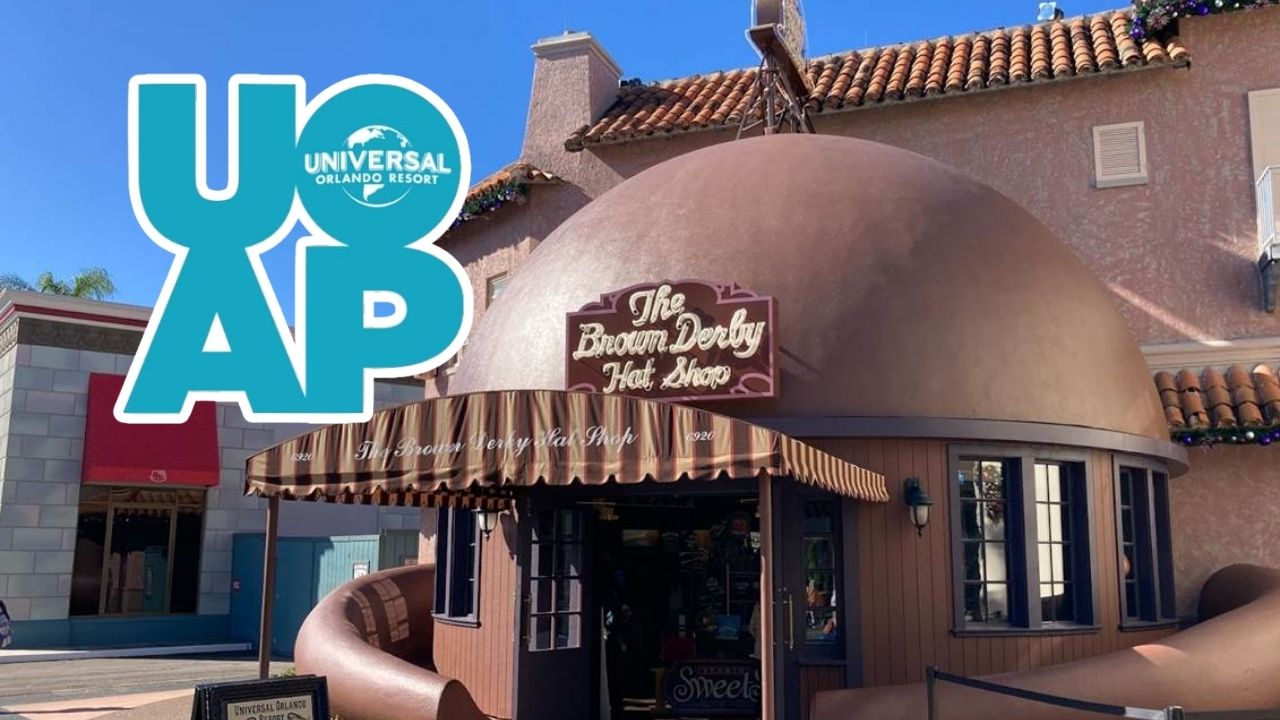 The Brown Derby Hat Shop at Universal Studios Florida, a building shaped like a giant brown domed hat with a striped awning and a hanging sign, with a large UOAP logo graphic overlaid at left