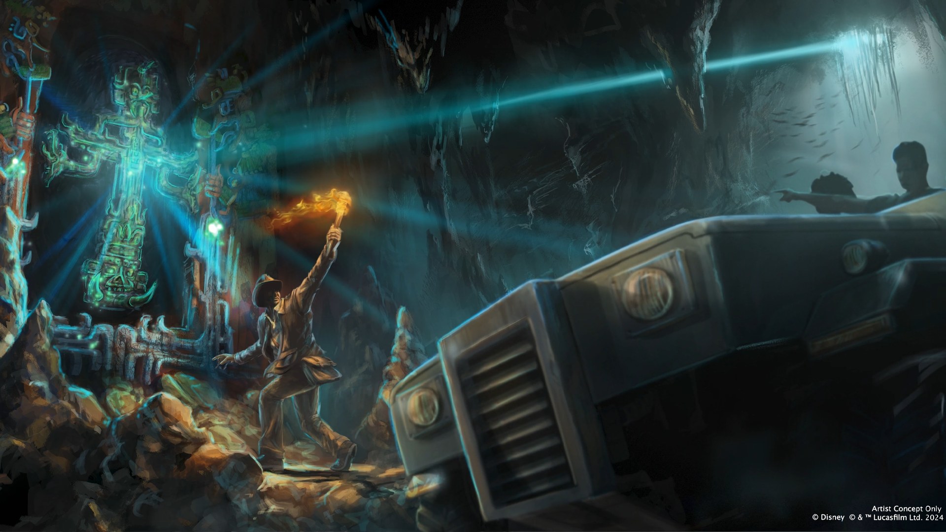 Disney concept art of an interior ride scene. Indiana Jones stands on rubble at the left in a fedora and leather jacket, holding a flaming torch overhead. Beside him a tall Maya stone carving glows bright green and teal, throwing beams of light across a dark cavern hung with stalactites. A dark open-sided ride vehicle with round headlamps fills the right of the frame, with a passenger reaching out an arm. Small text in the corner reads Artist Concept Only