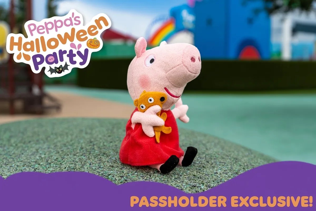 A Peppa Pig plush in a red dress hugging a small teddy bear, sitting on a playground surface, with the Peppa's Halloween Party logo and a Passholder Exclusive banner
