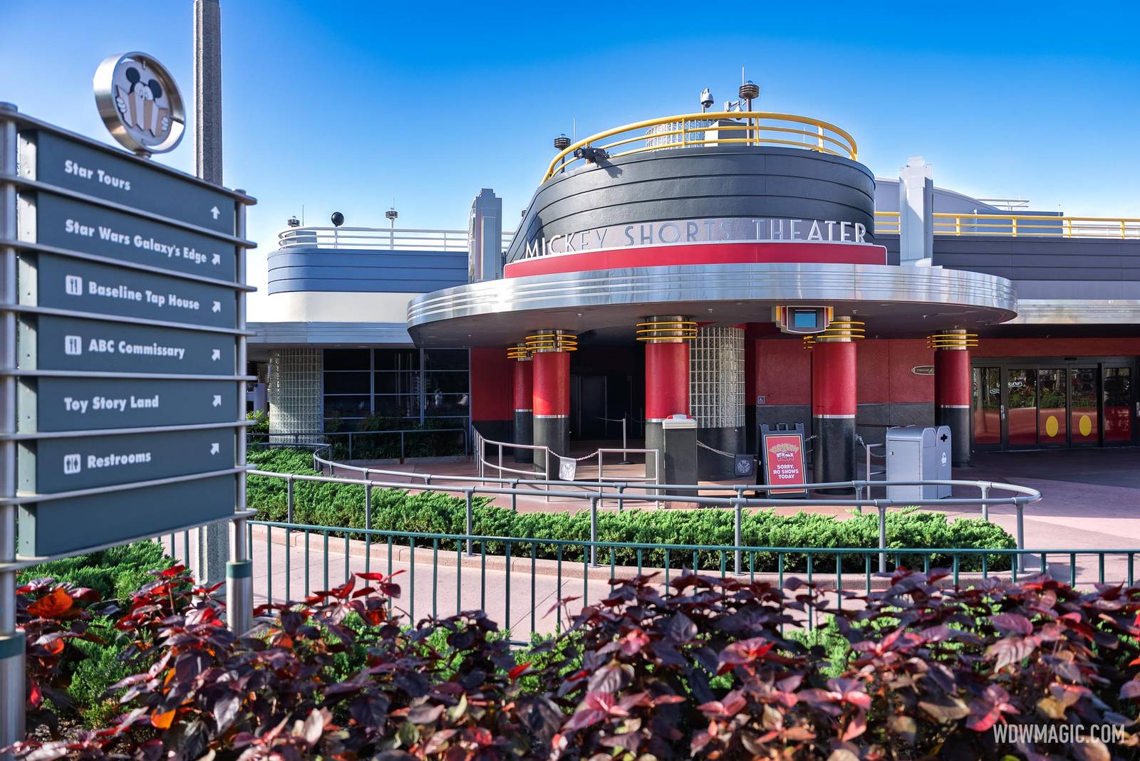 The Mickey Shorts Theater at Disney's Hollywood Studios with its chrome and red art deco entrance, a Sorry, No Shows Today sign out front and a directional sign pointing to Star Tours, Galaxy's Edge and Toy Story Land