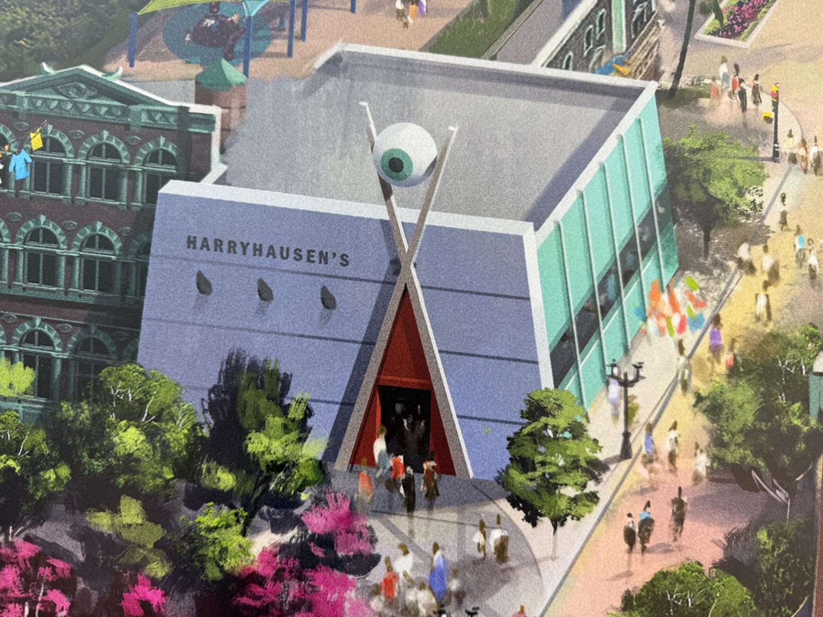 Concept art of a gray, boxy building labeled Harryhausen's, with a red triangular entrance framed by two giant crossed chopsticks topped by an eyeball, guests walking in from a tree-lined street