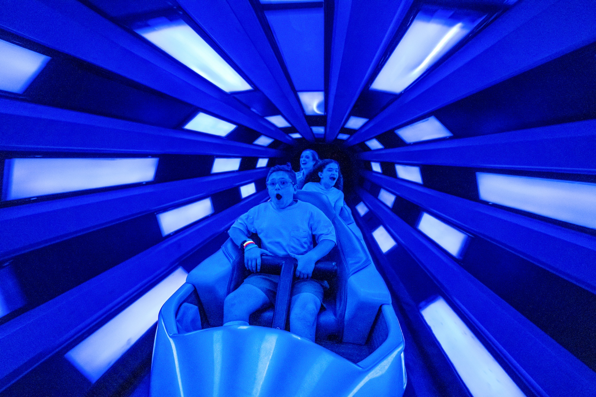 Riders inside Space Mountain at Magic Kingdom