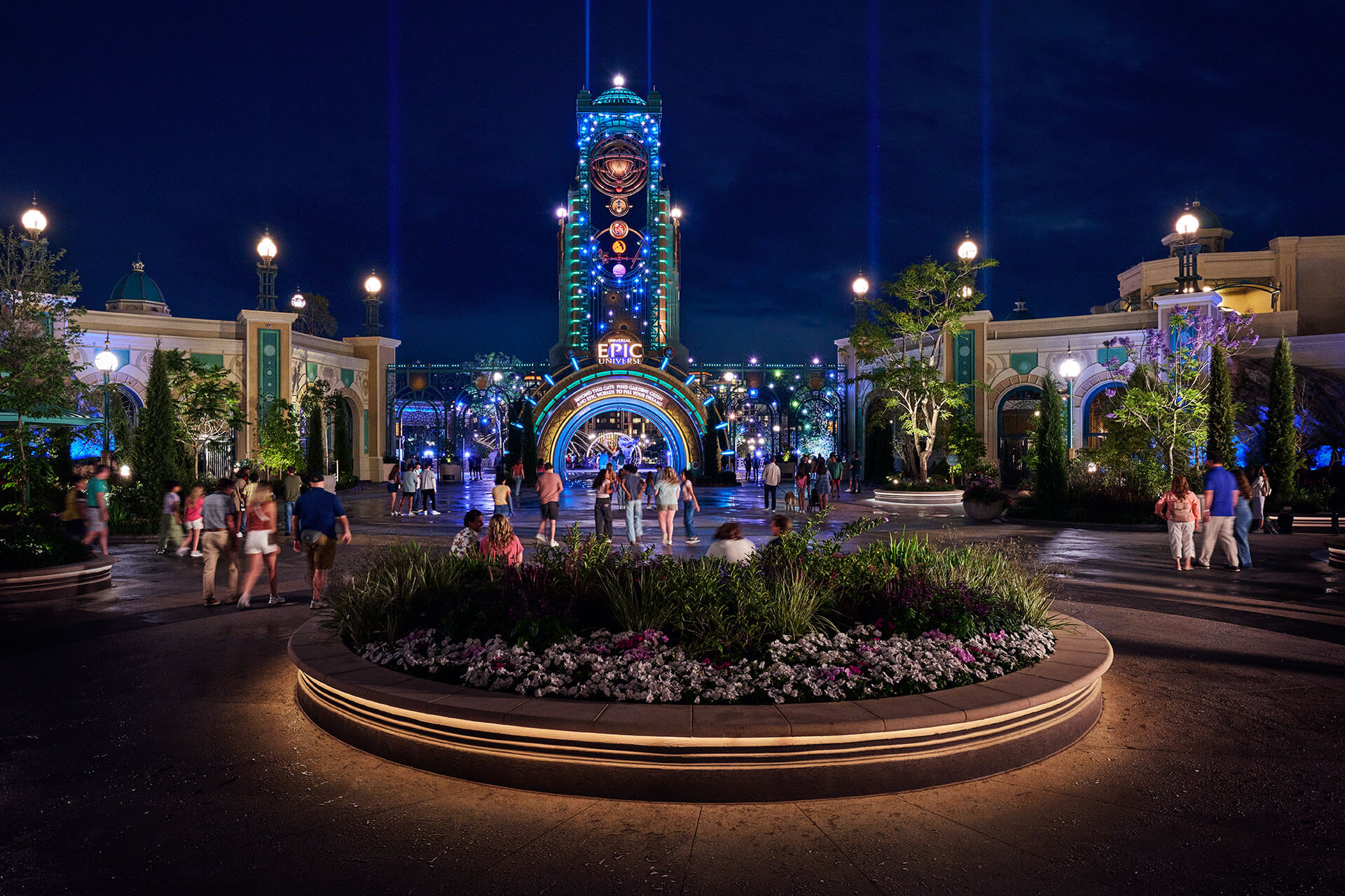 Celestial Park at Universal Epic Universe lit up at night.
