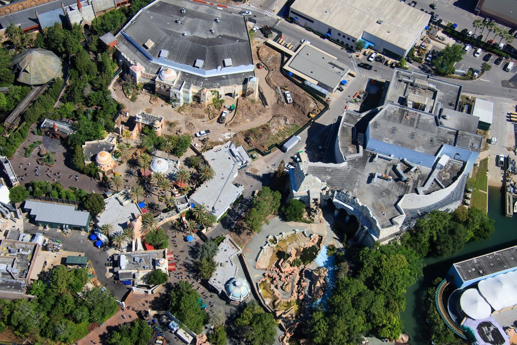Aerial photo of the Lost Continent at Universal's Islands of Adventure with construction walls surrounding the former Sindbad Theater and Poseidon's Fury.