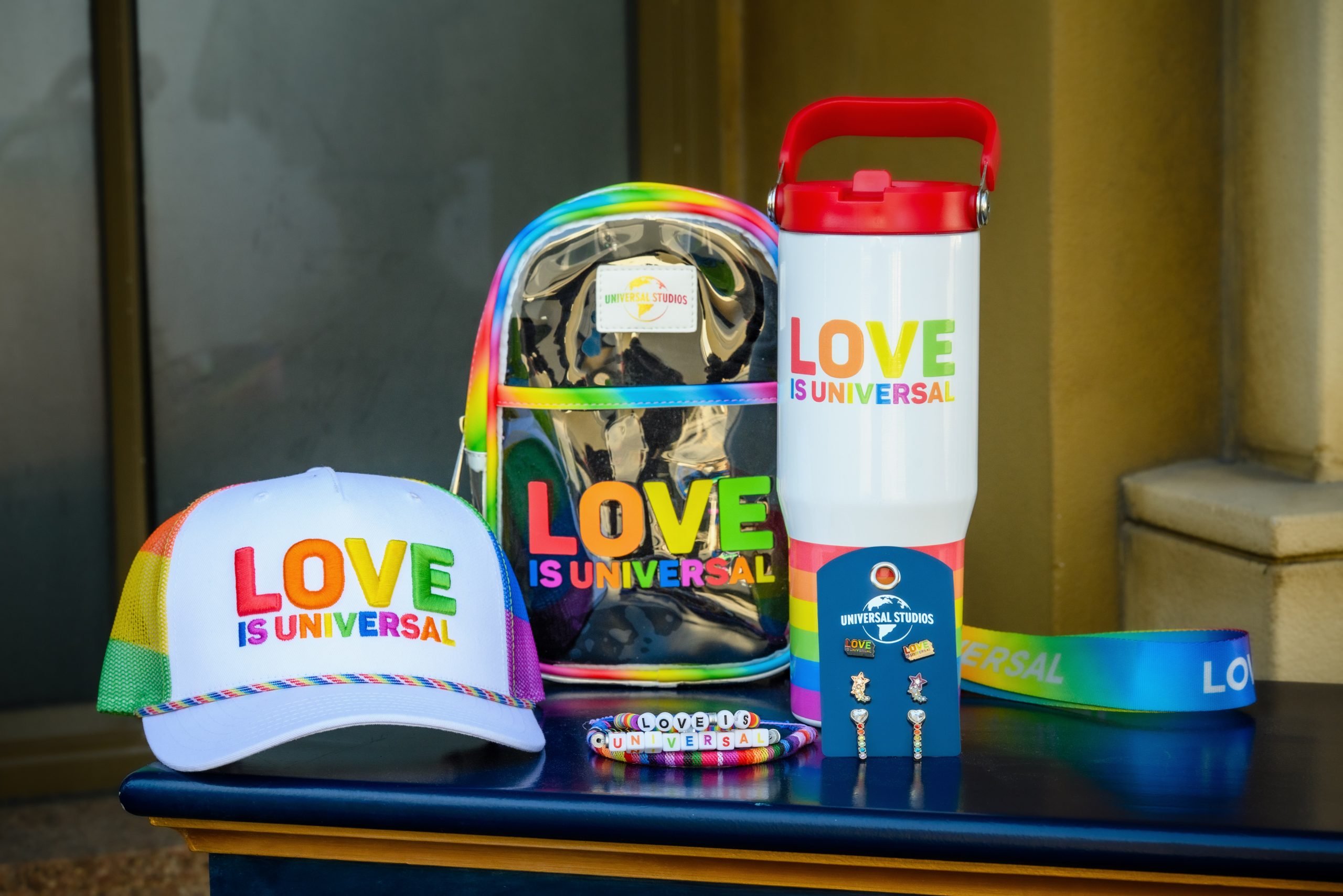 Detail view of pieces from the 2026 Love is Universal Pride collection at Universal Studios Stores.