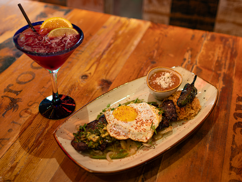 Churrasco Steak Platter with avocado chimichurri, rice, beans and eggs at Antojitos in Universal CityWalk