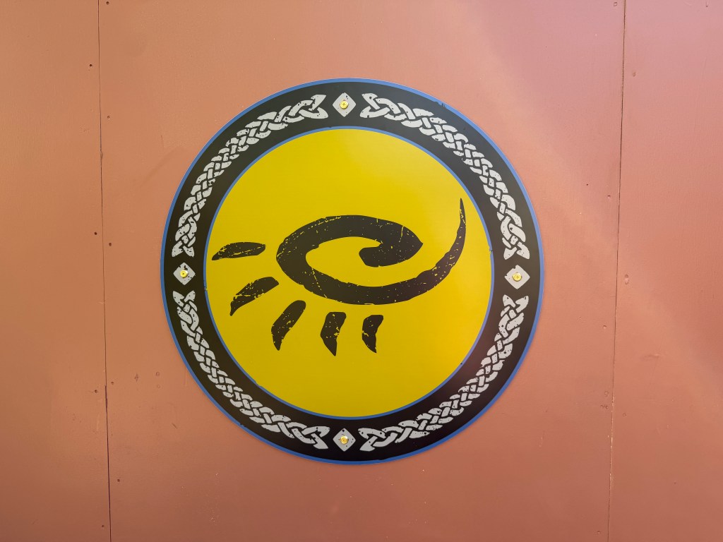 Construction walls in front of the Lost Continent logo signage