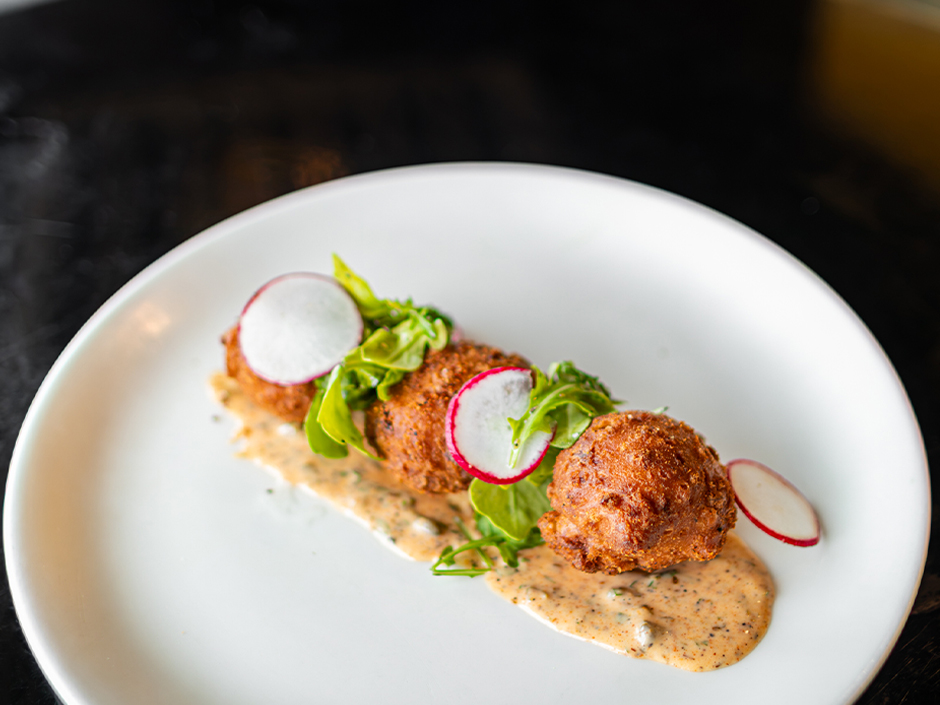 Crunch Corn Fritters with slaw at NBC Sports Grill and Brew in Universal CityWalk